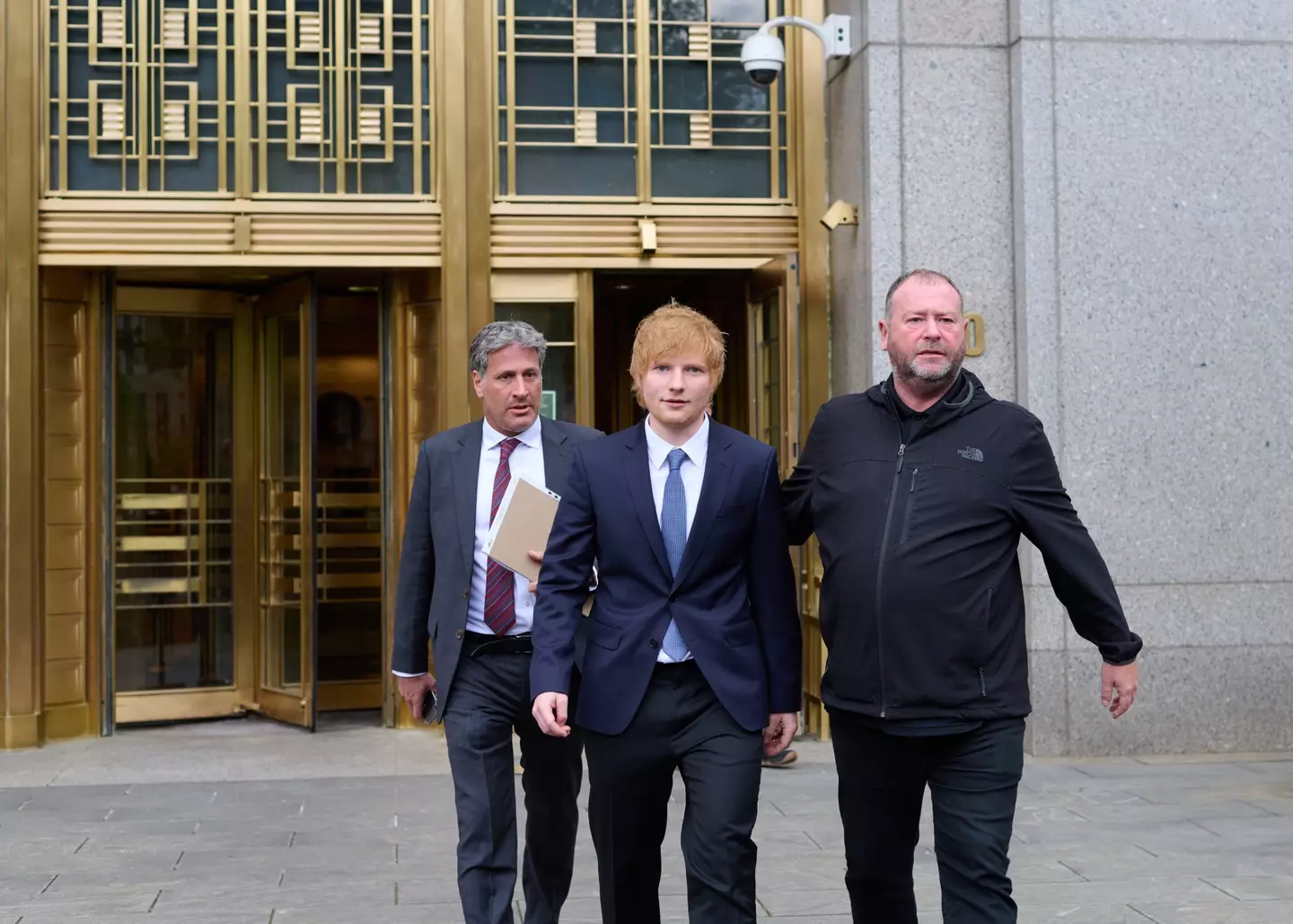 Ed Sheeran played his guitar in court.