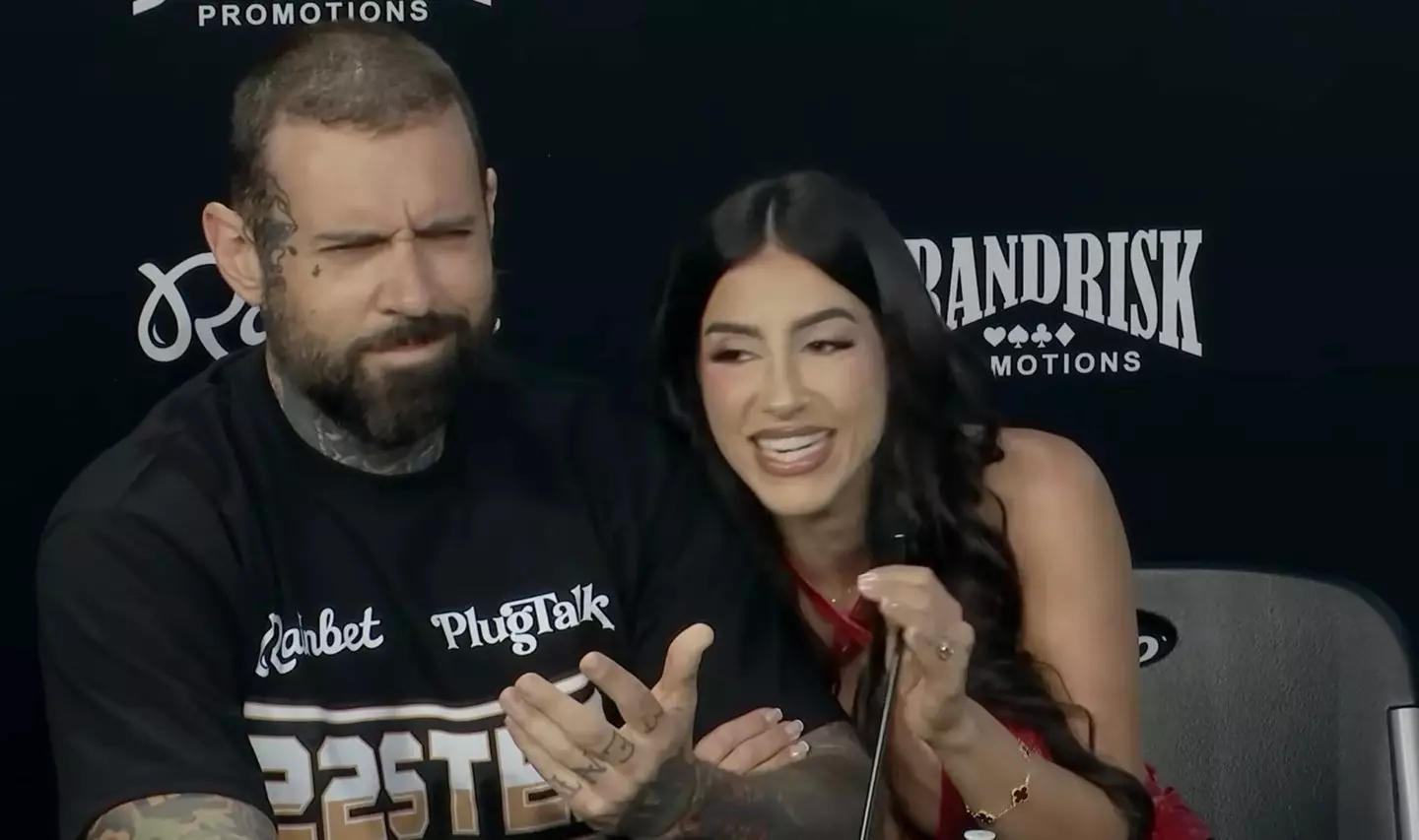 Adam22 didn't look very happy when Lena began praising his rival for being 'large in many ways' (YouTube/Adin Live)
