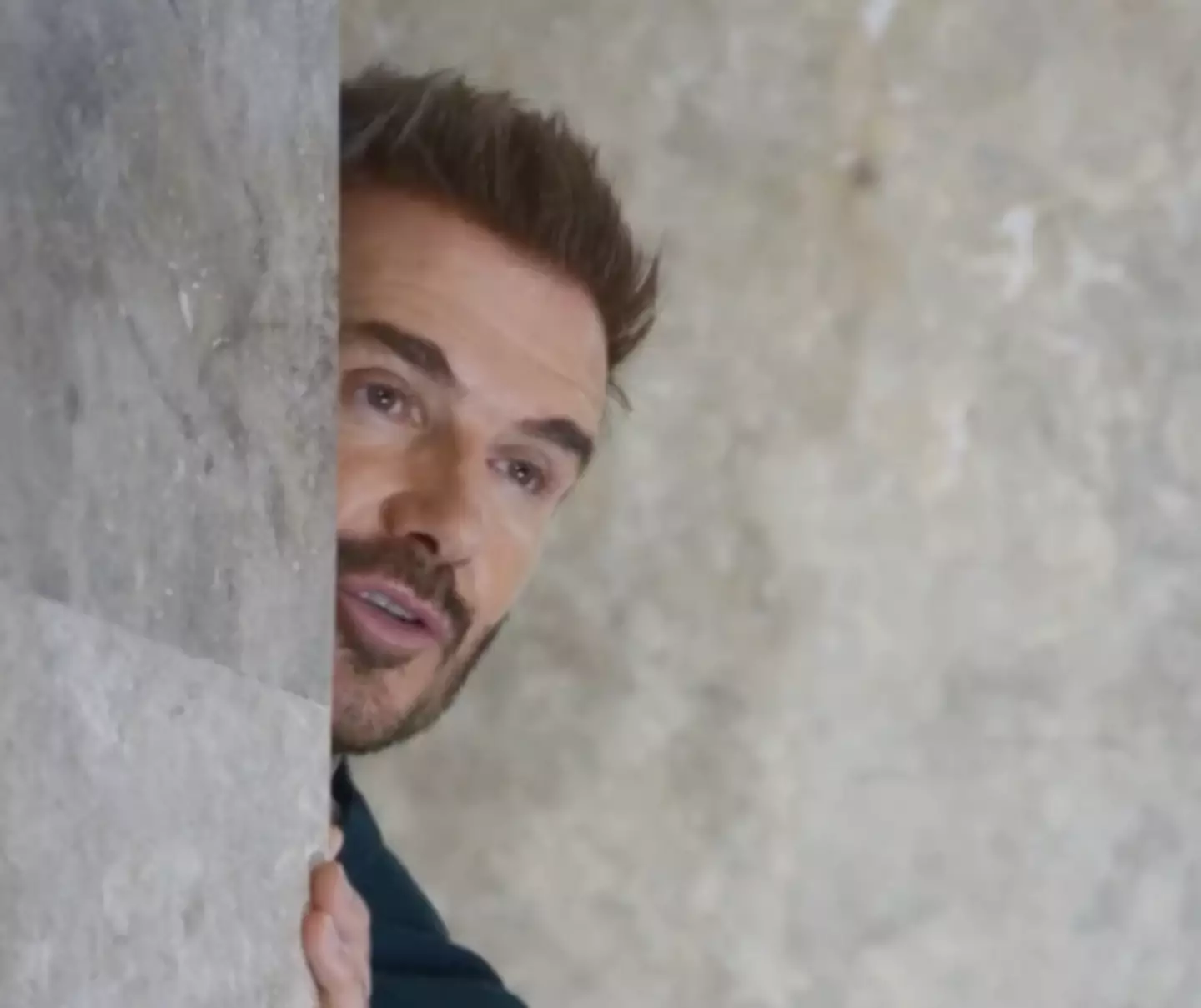 David Beckham recreated the documentary scene with the same shot of him peaking around the corner.