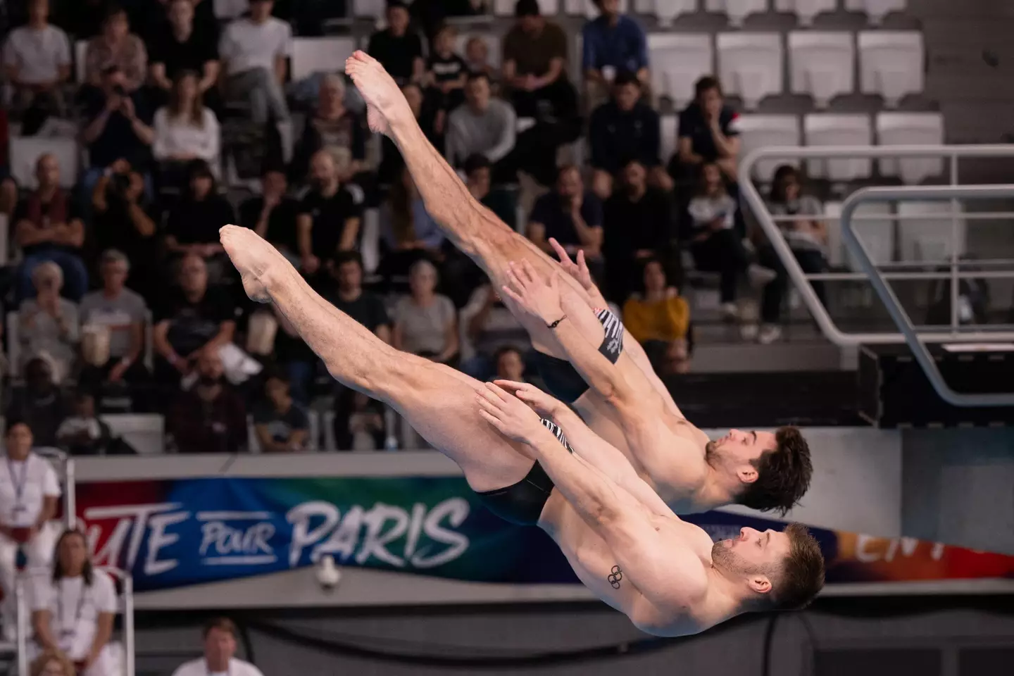 Why are they dressed like that? Because they'd be at a competitive disadvantage if they weren't. (MIGUEL MEDINA/AFP via Getty Images)