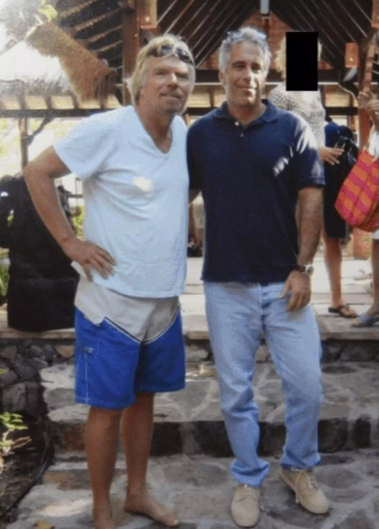 Richard Branson seen smiling alongside the convicted sex offender (Department of Justice)