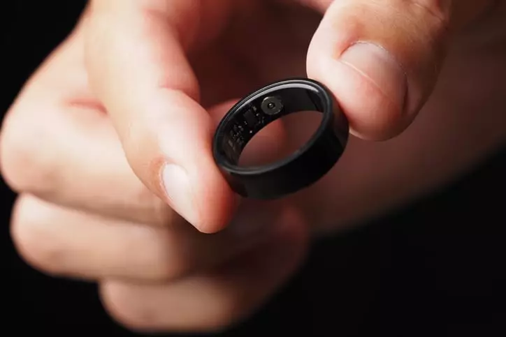 A black ring - especially on the middle finger of the right hand - could indicate that someone is open to swinging (Getty Stock Images)
