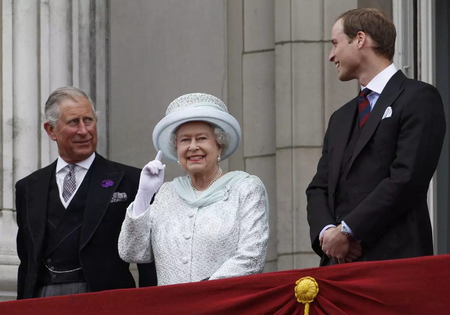 Queen Elizabeth II with King Charles and Prince William.