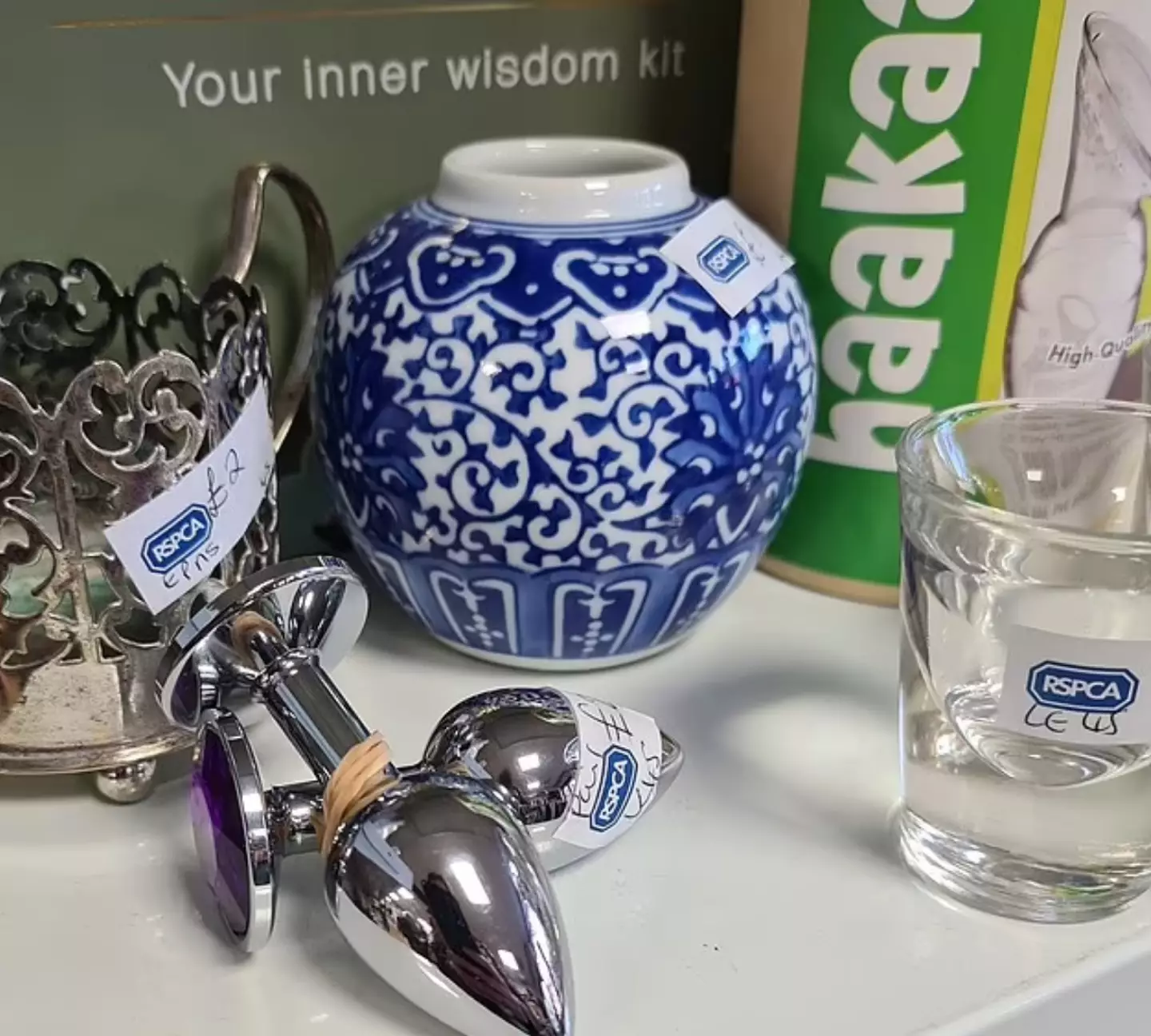 Charity responds to embarrassed shop workers who displayed sex toys in window thinking they were doorknobs 2 Probably not something you'd expect to see. (BNPS)