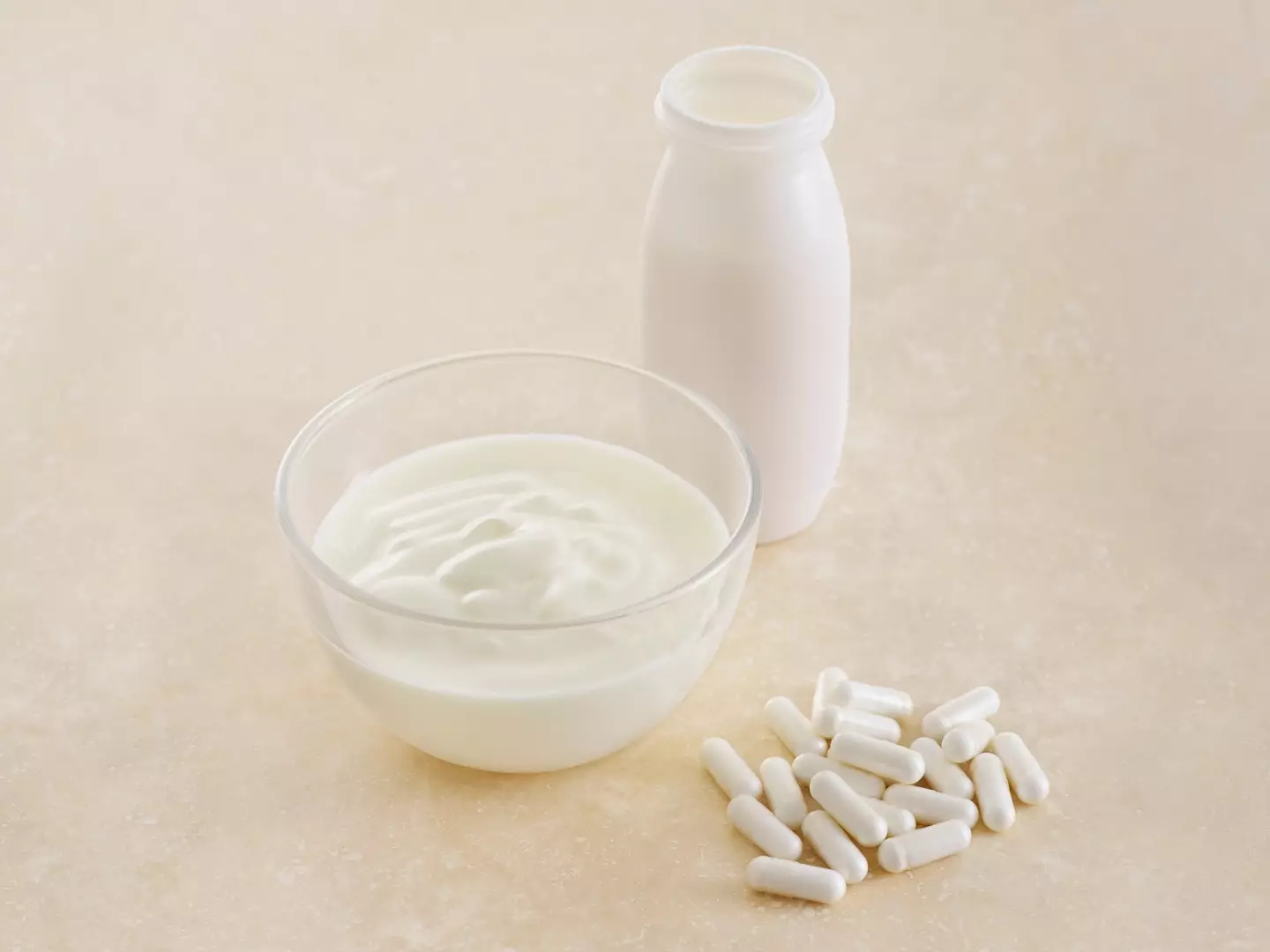 Probiotics can come in the form of yoghurts or supplements (Getty Stock Image)
