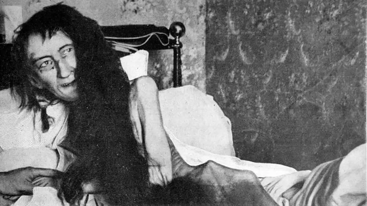Shocking truth behind 'most terrifying photo ever' of woman lying on her bed