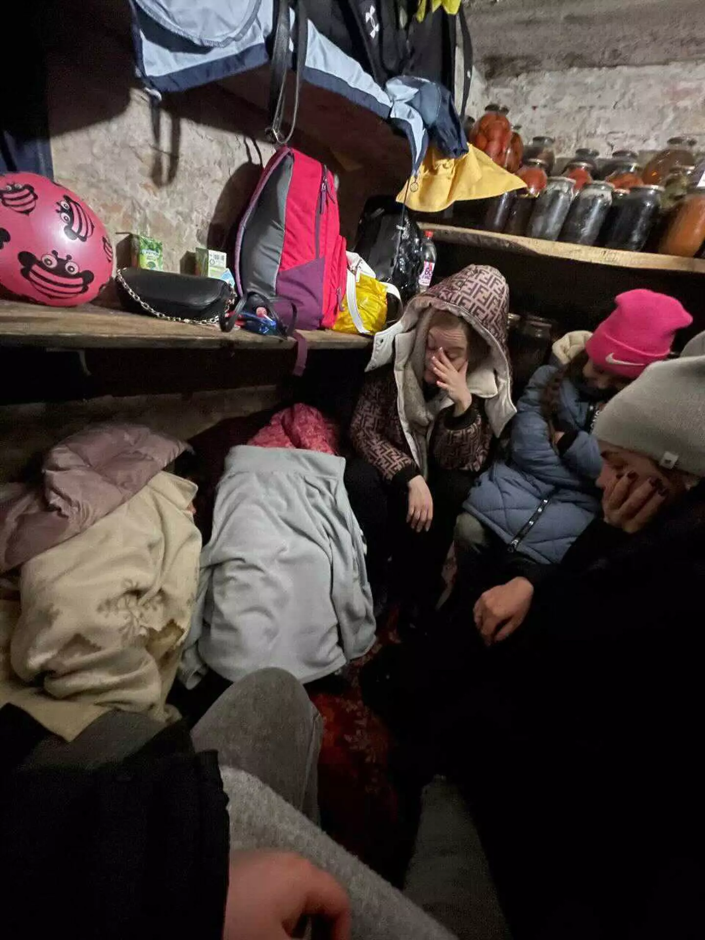 Julia's sister and family are hiding in a basement, with little food and water.