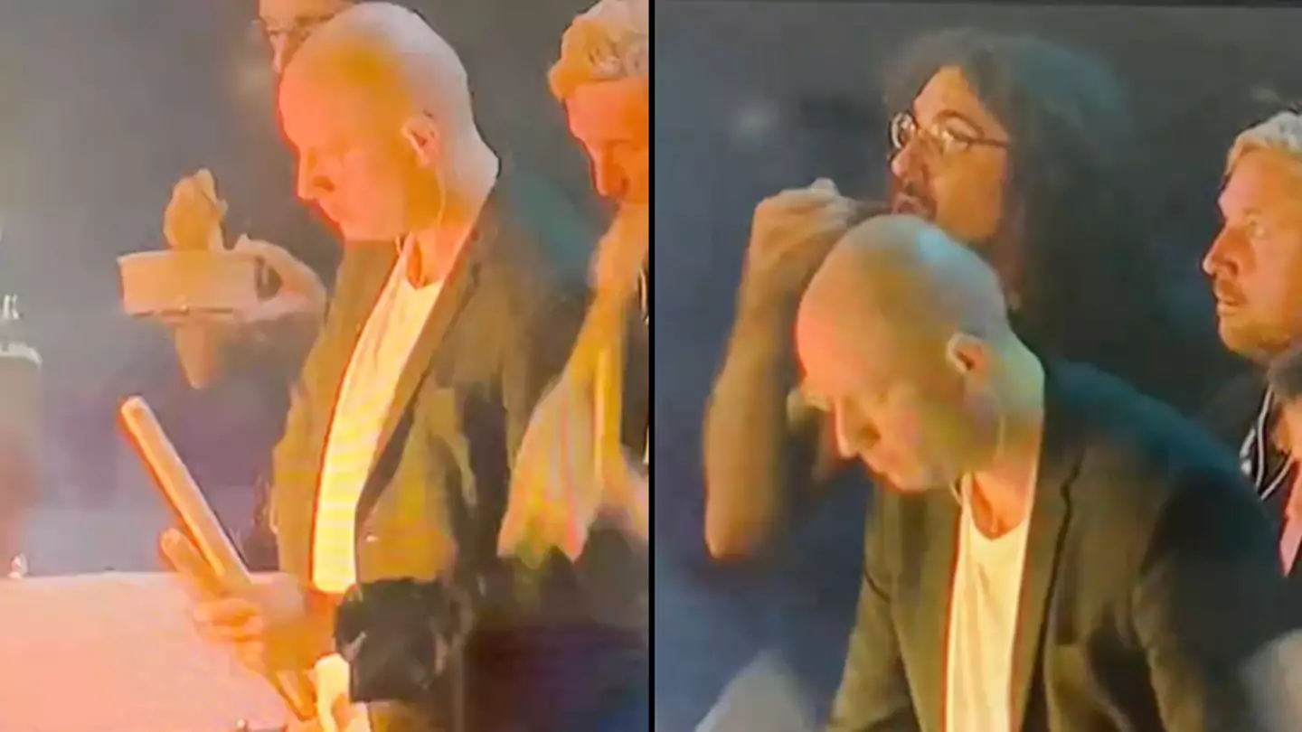 Olympics viewers spot incredible moment man caught eating midway through closing ceremony orchestra performance