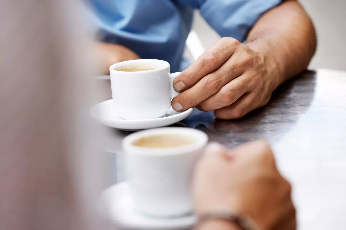 Pay attention to the coffee cup (Getty Stock Images)