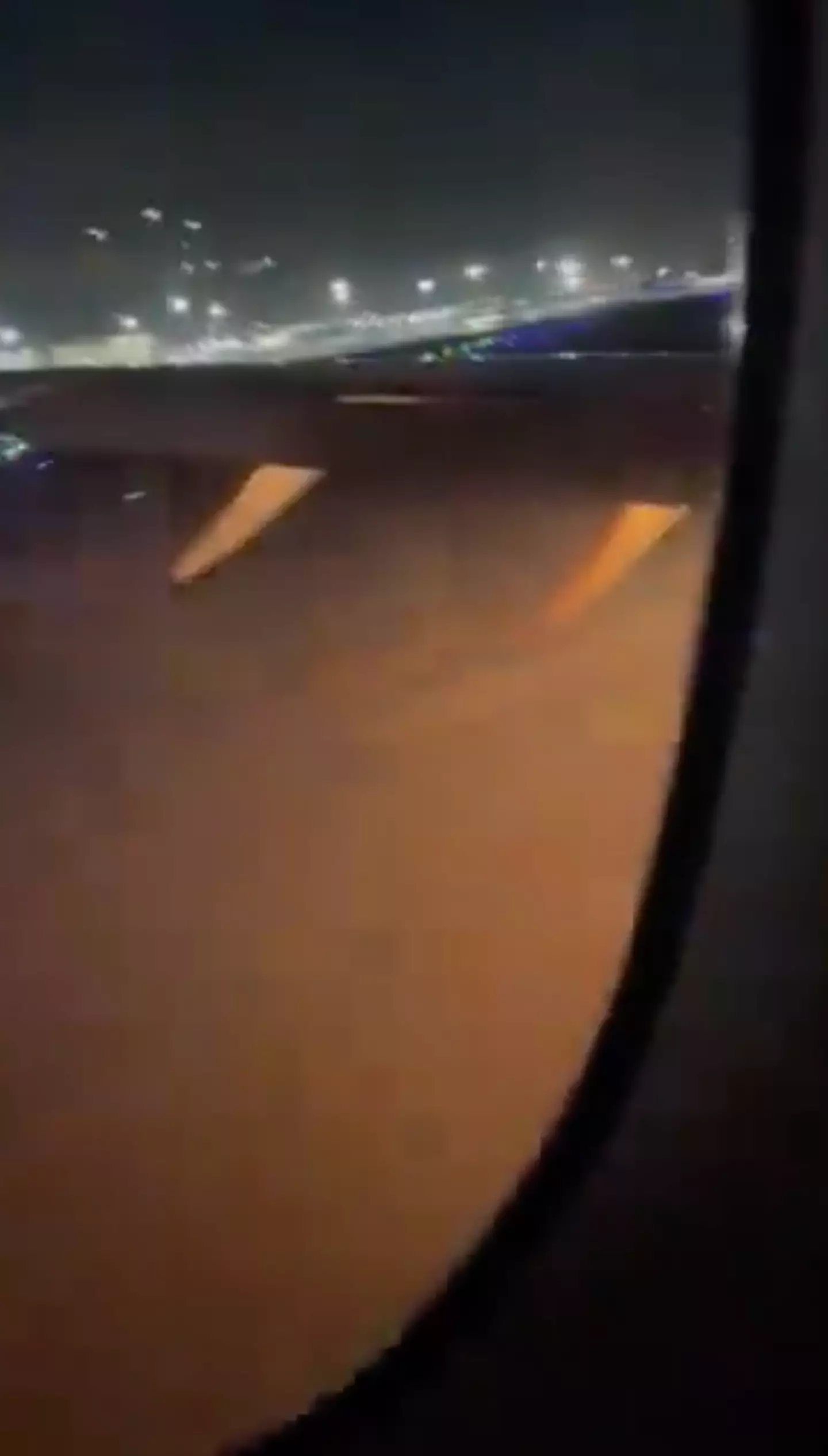 One clip shows smoke coming from the plane.