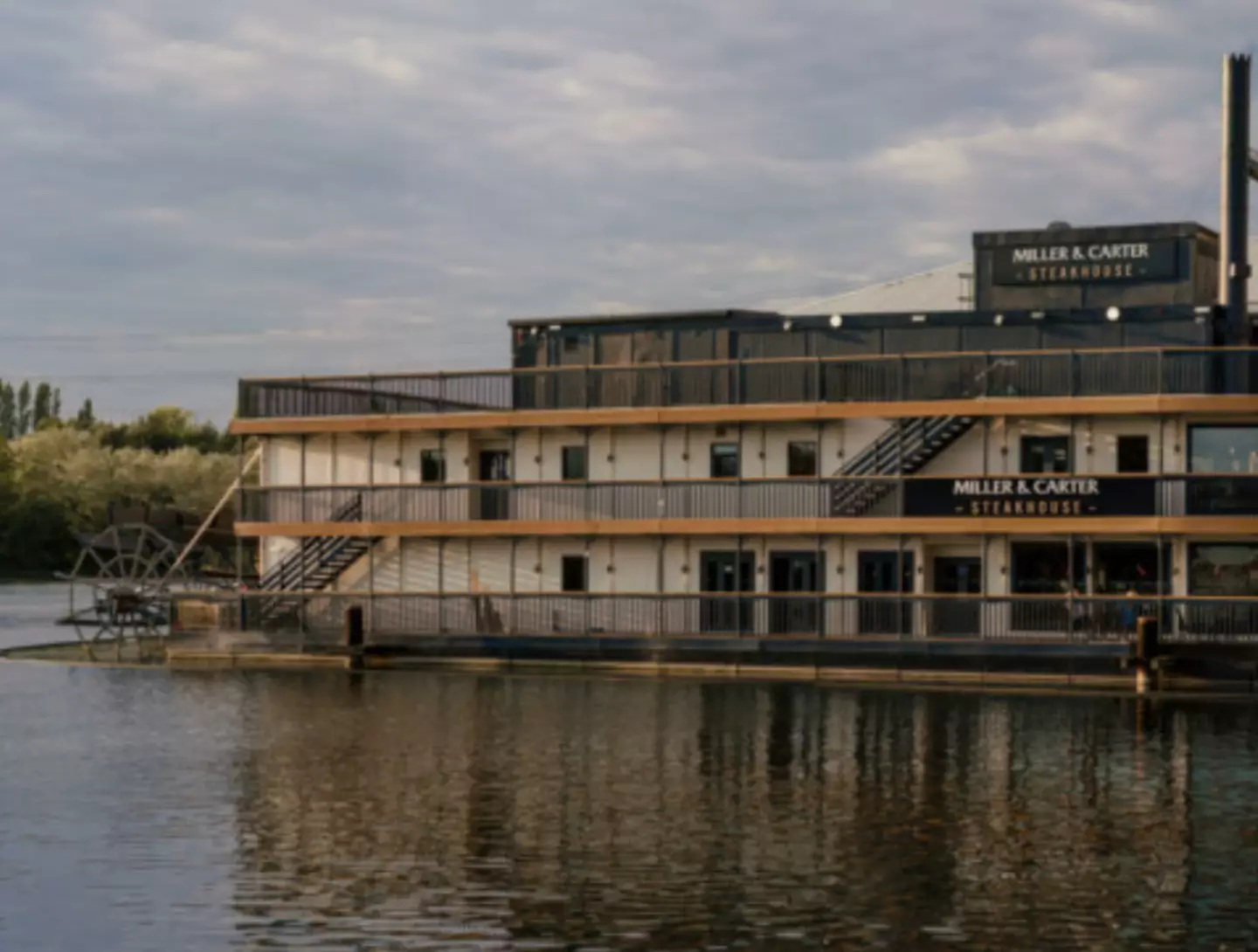 The restaurant is located on a moored boat.