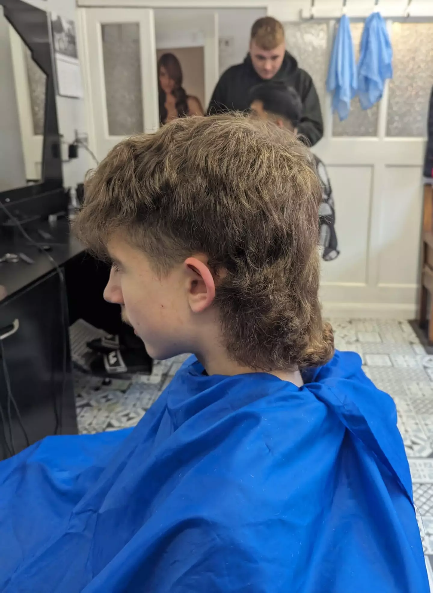 Toby has since cut his hair while raising funds for charity.