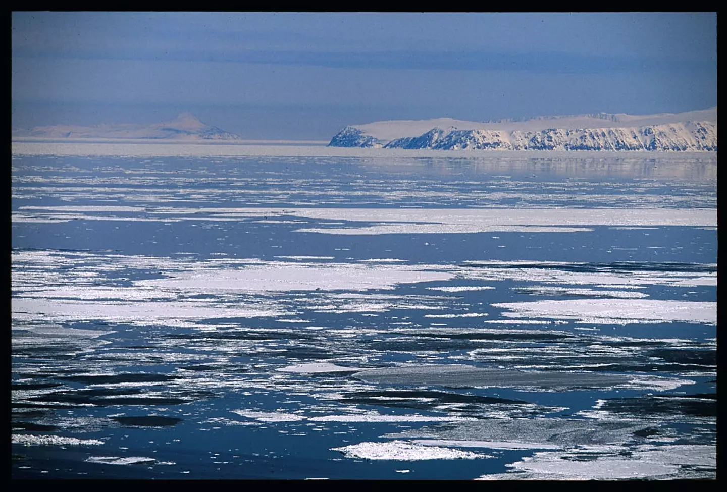 That's the Russian island of Big Diomede on the right, and the US island Little Diomede in the distance on the left (Jacques Langevin/Sygma/Sygma via Getty Images)