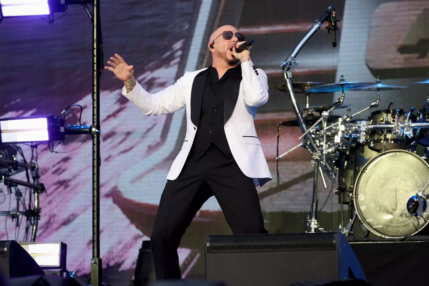 Pitbull is bringing the party again in 2026 (Photo by Kevin Mazur/Getty Images for Live Nation)