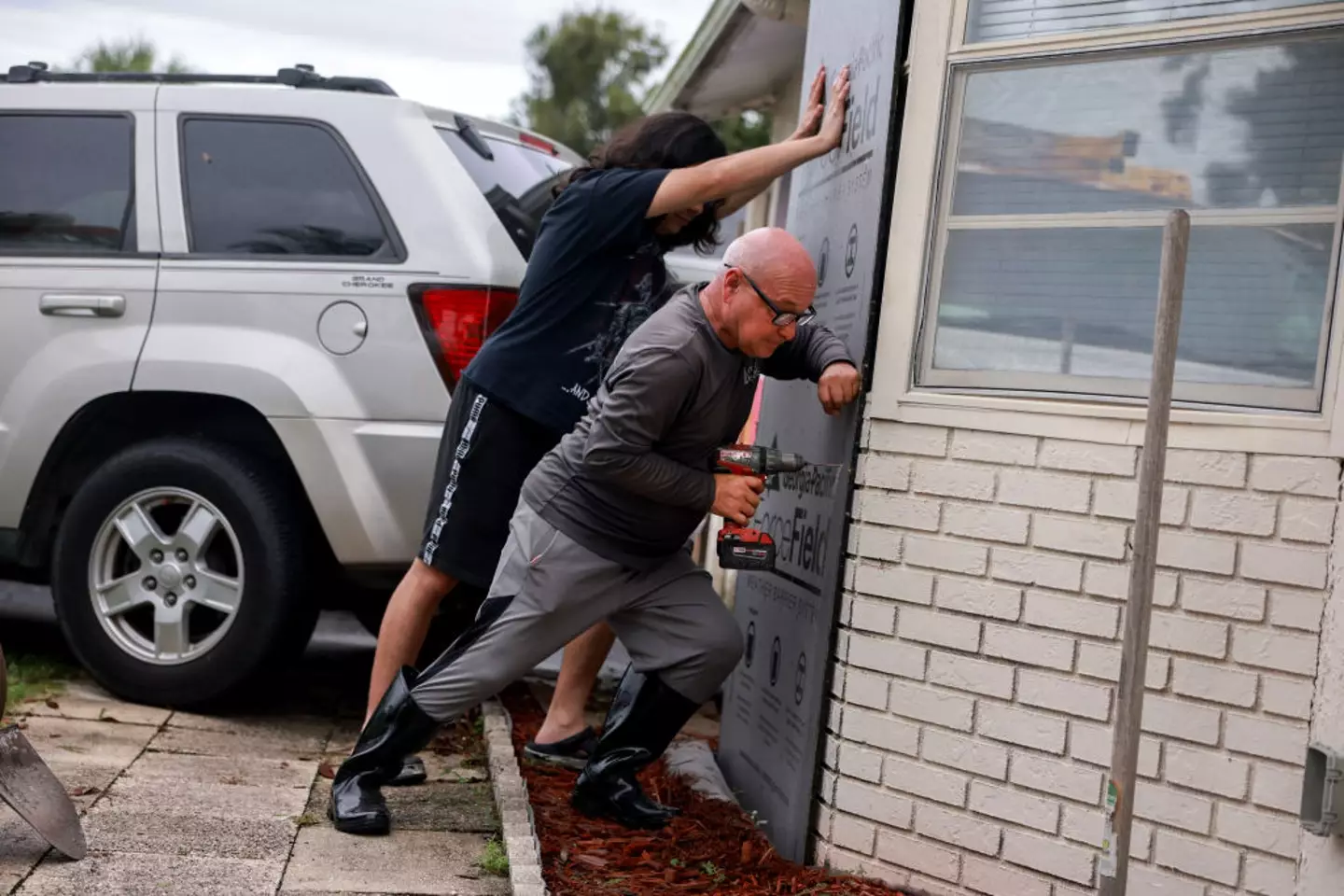 Residents are doing their best to secure their homes ahead of the hurricane's arrival (Joe Raedle/Getty Images)