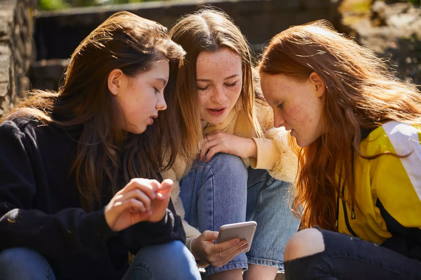 Gen Alpha parents say they're struggling to have conversations with their kids (Getty Stock Photo)