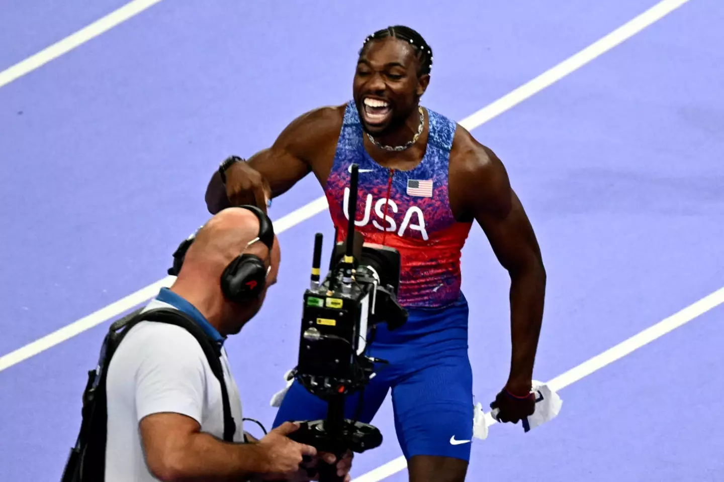 Noah Lyles was ecstatic with the result. (LOIC VENANCE/AFP via Getty Images)