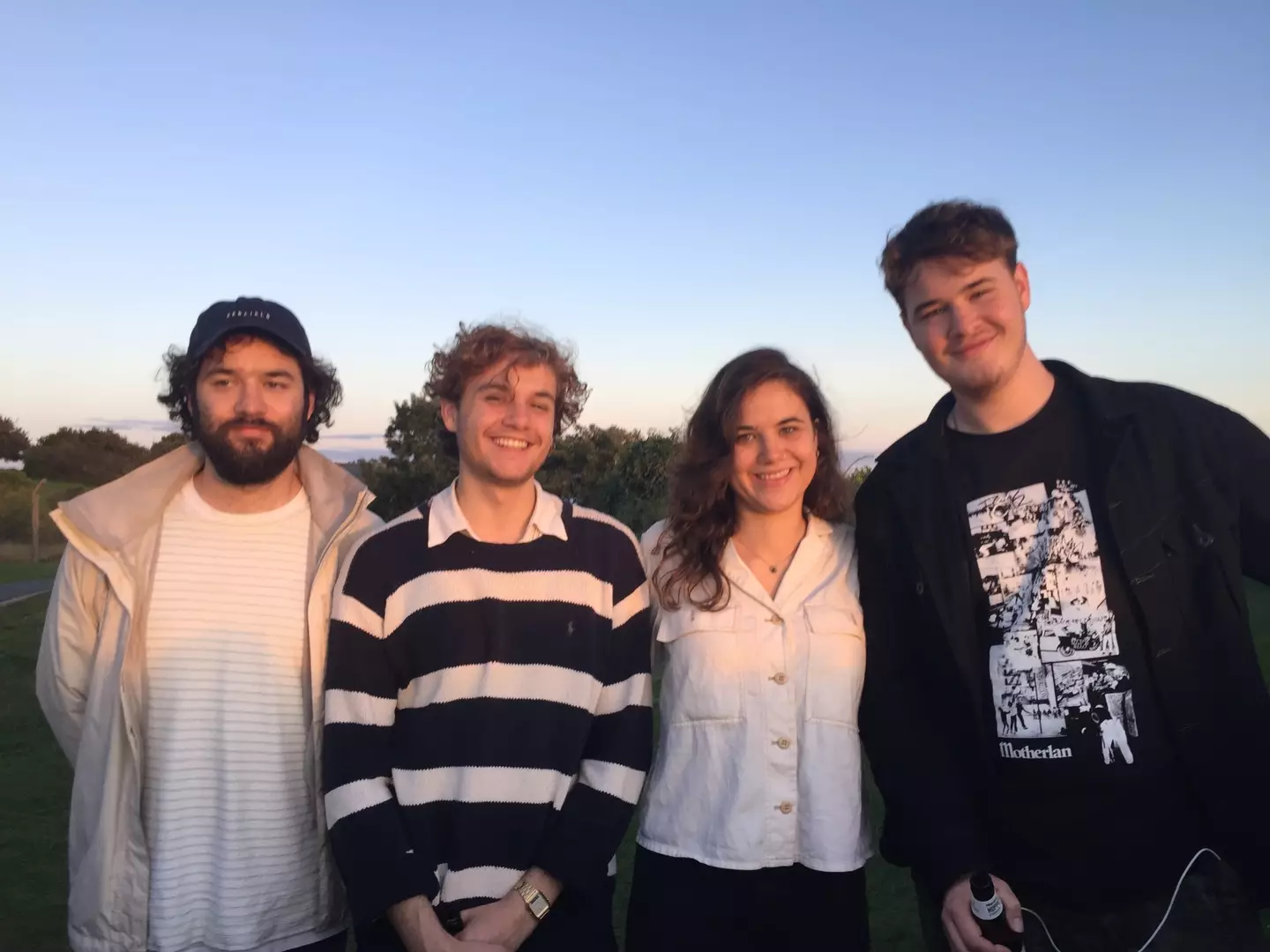 William (right) pictured with his three siblings Theo, Edward and Emily (PA/Family Handout)