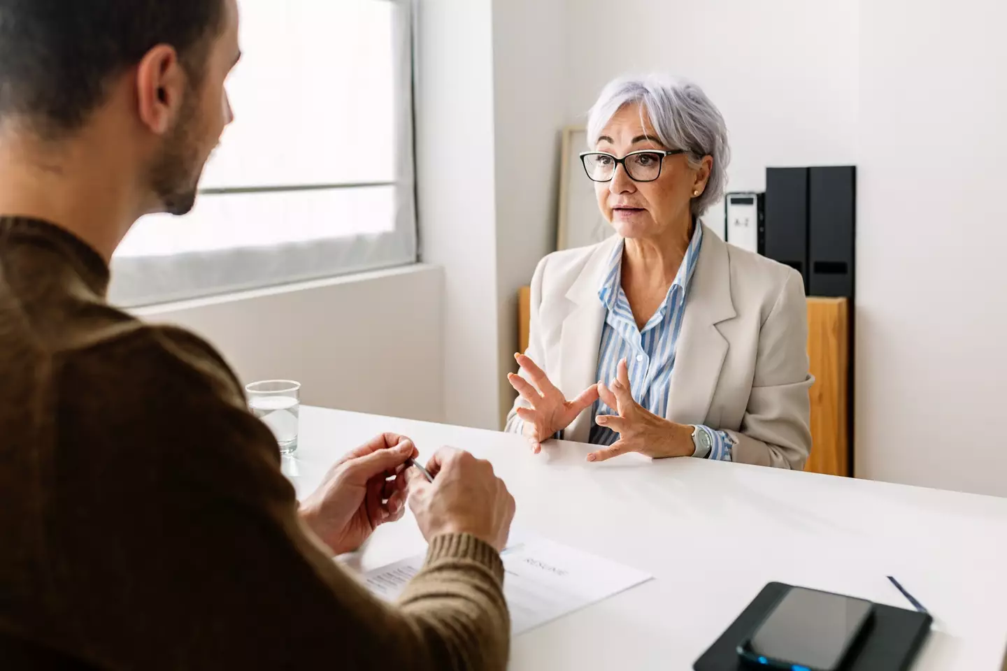 "I really like the way you asked me for that glass of water, you're hired." (Getty Stock Photo)