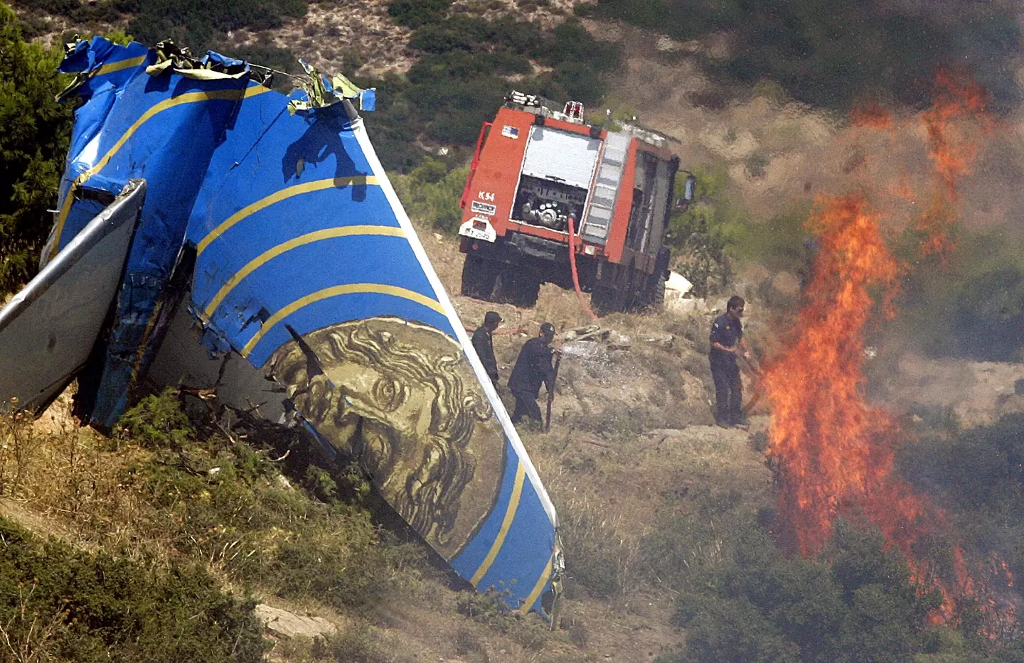 The Boeing 737-300 burst into flames after smashing into a Greek hillside (LOUISA GOULIAMAKI/AFP via Getty Images)