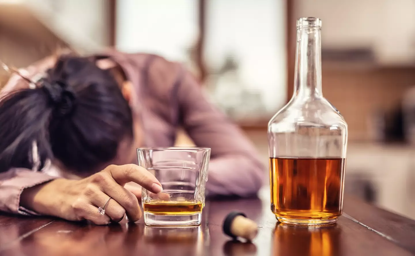 Alcohol dependency can be notoriously difficult to overcome without professional help (Getty Stock Image)