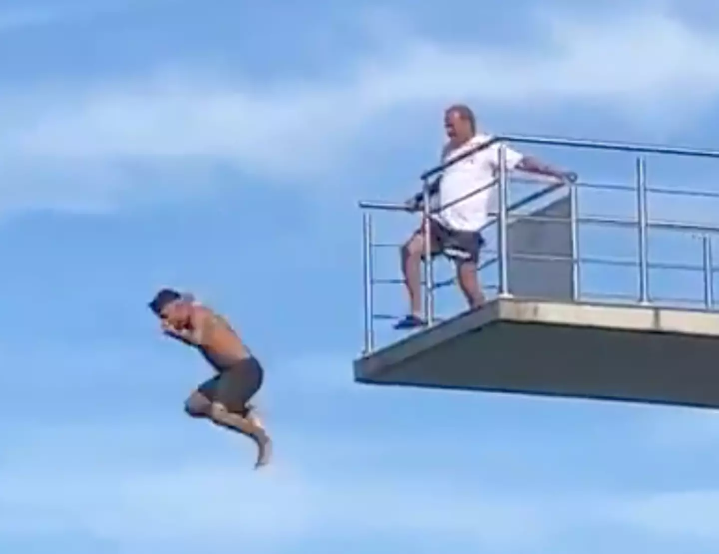 The lifeguard didn't stop until the man was off the ledge.