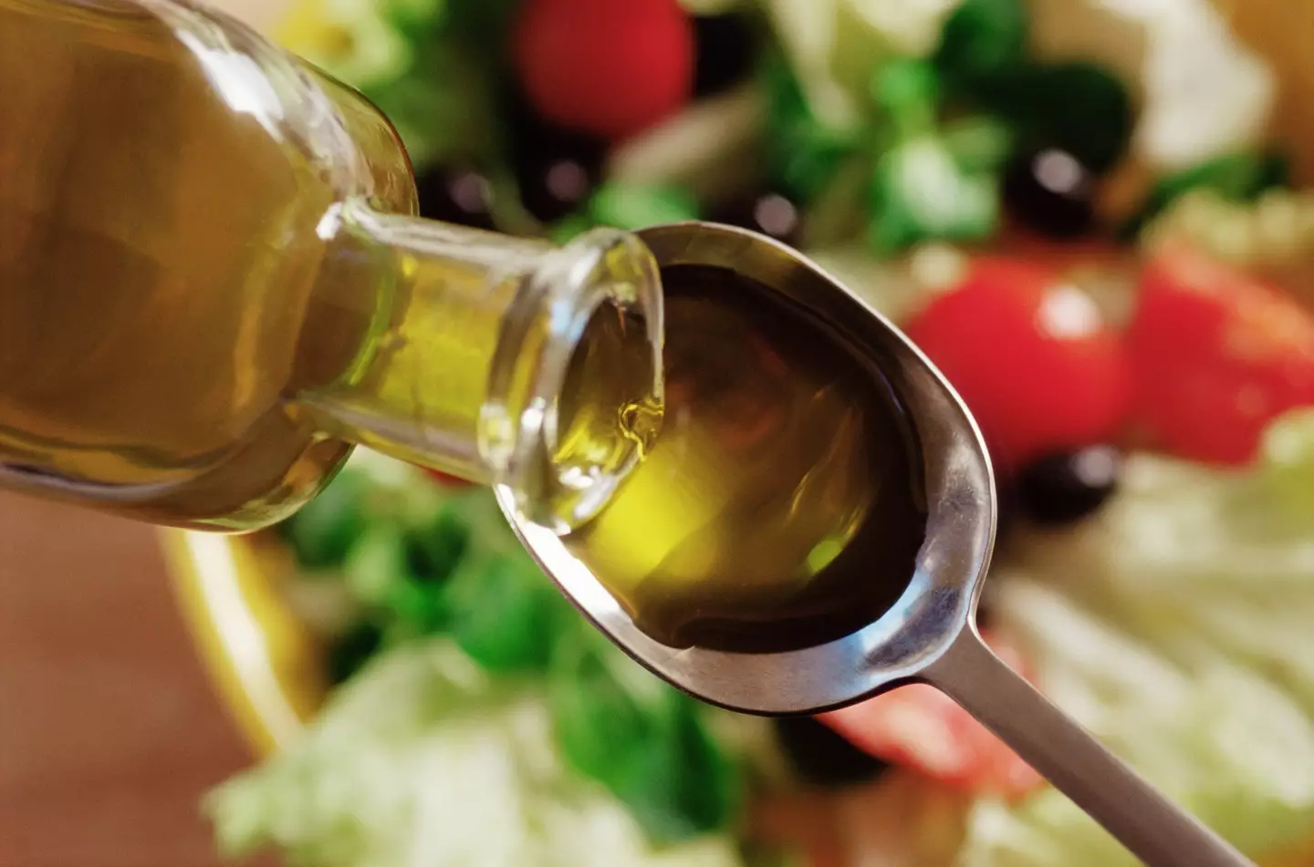People have been starting their day off with a shot of olive oil on an empty stomach (Getty Stock Image)