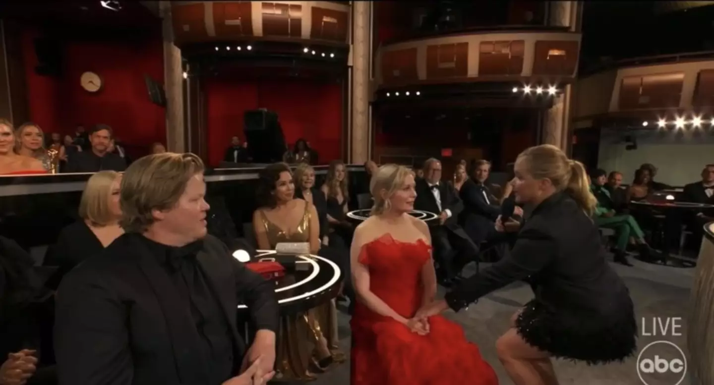 Amy Schumer with Jesse Plemons and Kirsten Dunst during the awkward skit.