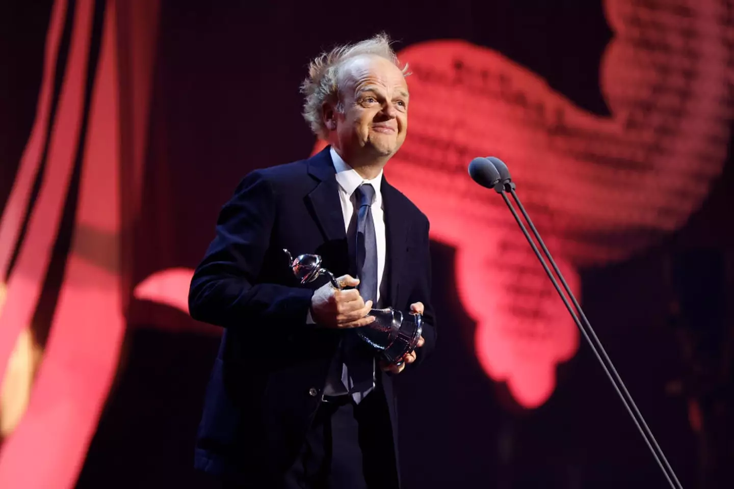 Toby Jones on stage with the Drama Performance award during the NTAs 2024 (John Phillips/Getty Images)