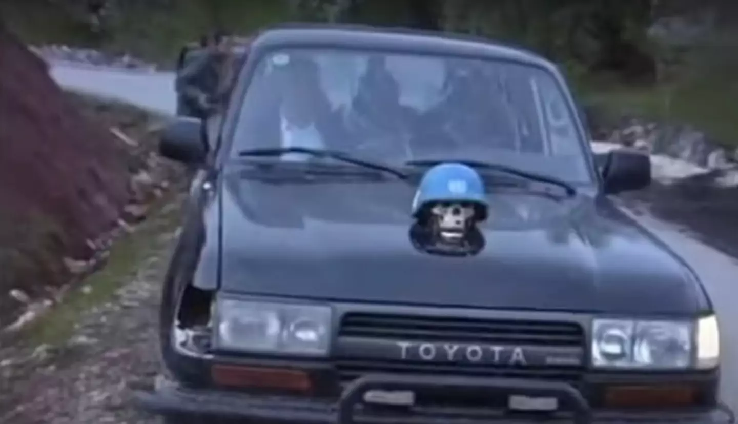 The car that the former militia leader is alleged to have driven around (X)