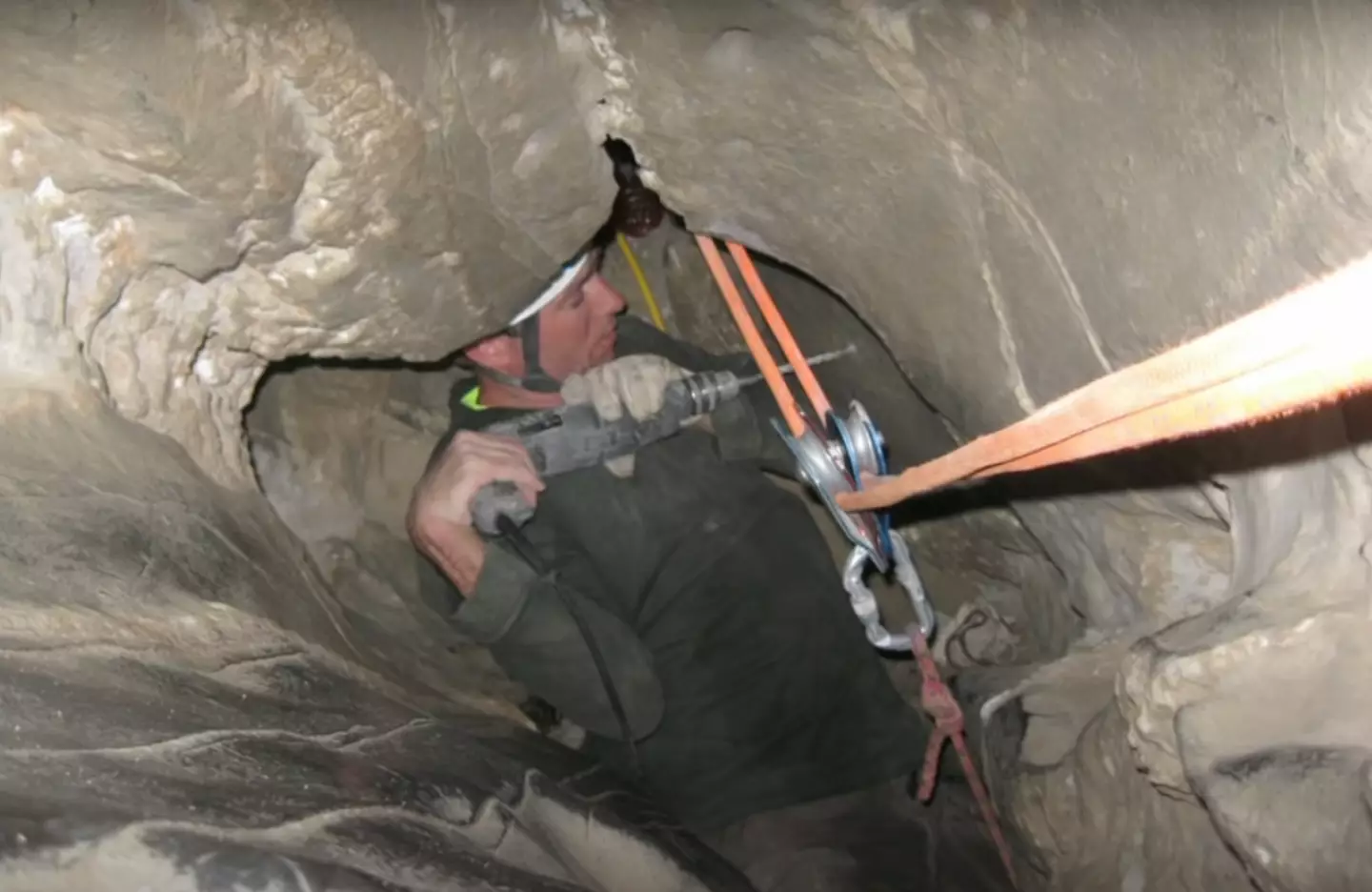 A rescuer attempted to extricate Jones from the cave.