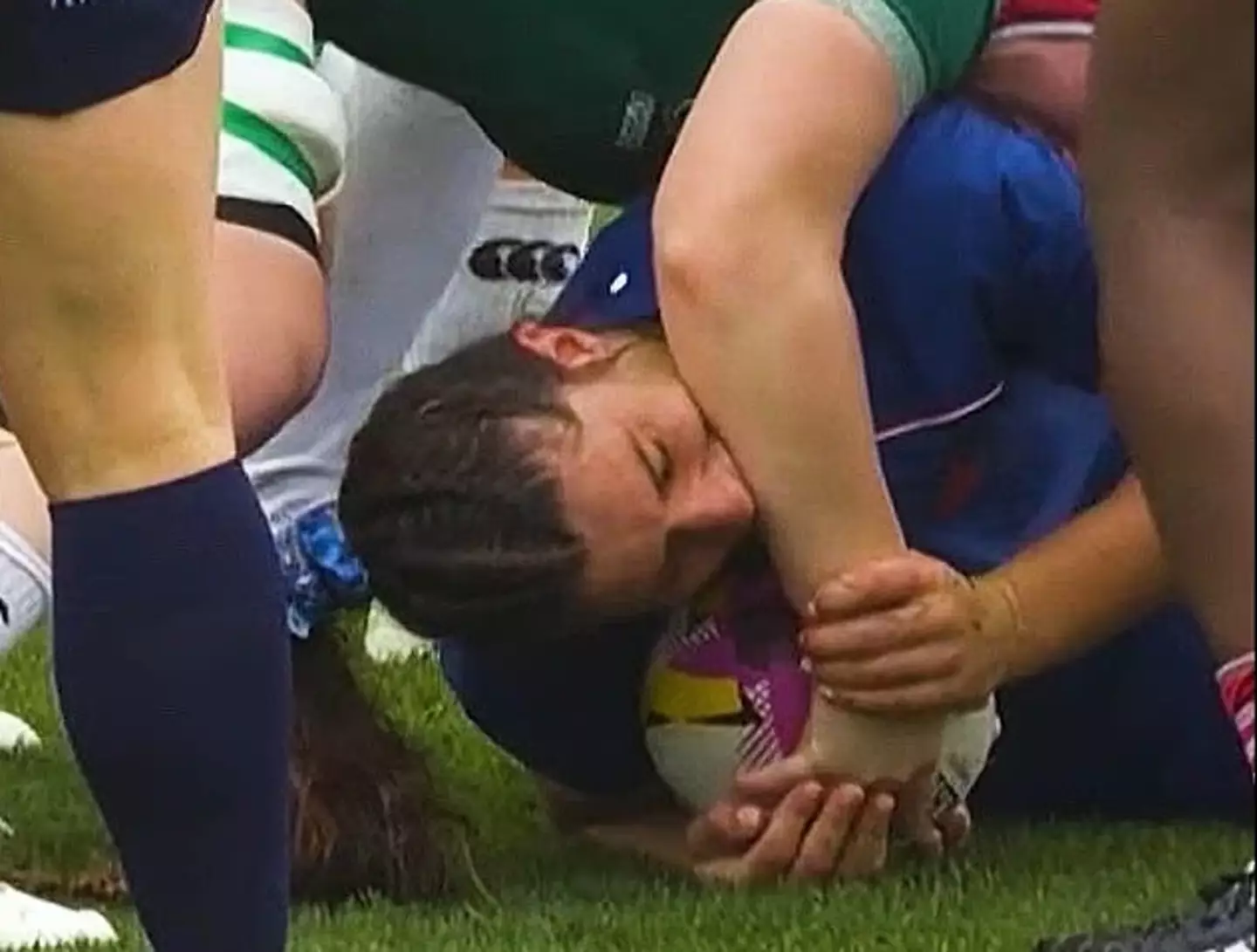 The French player has been accused of attempting to bite her rugby rival during the quarter-finals (X)