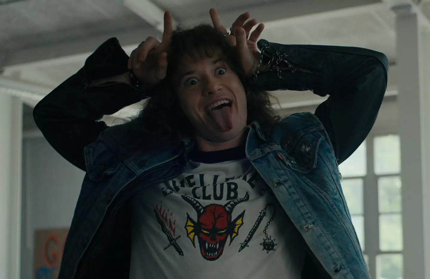 Eddie can be seen playing the guitar in the trailer.