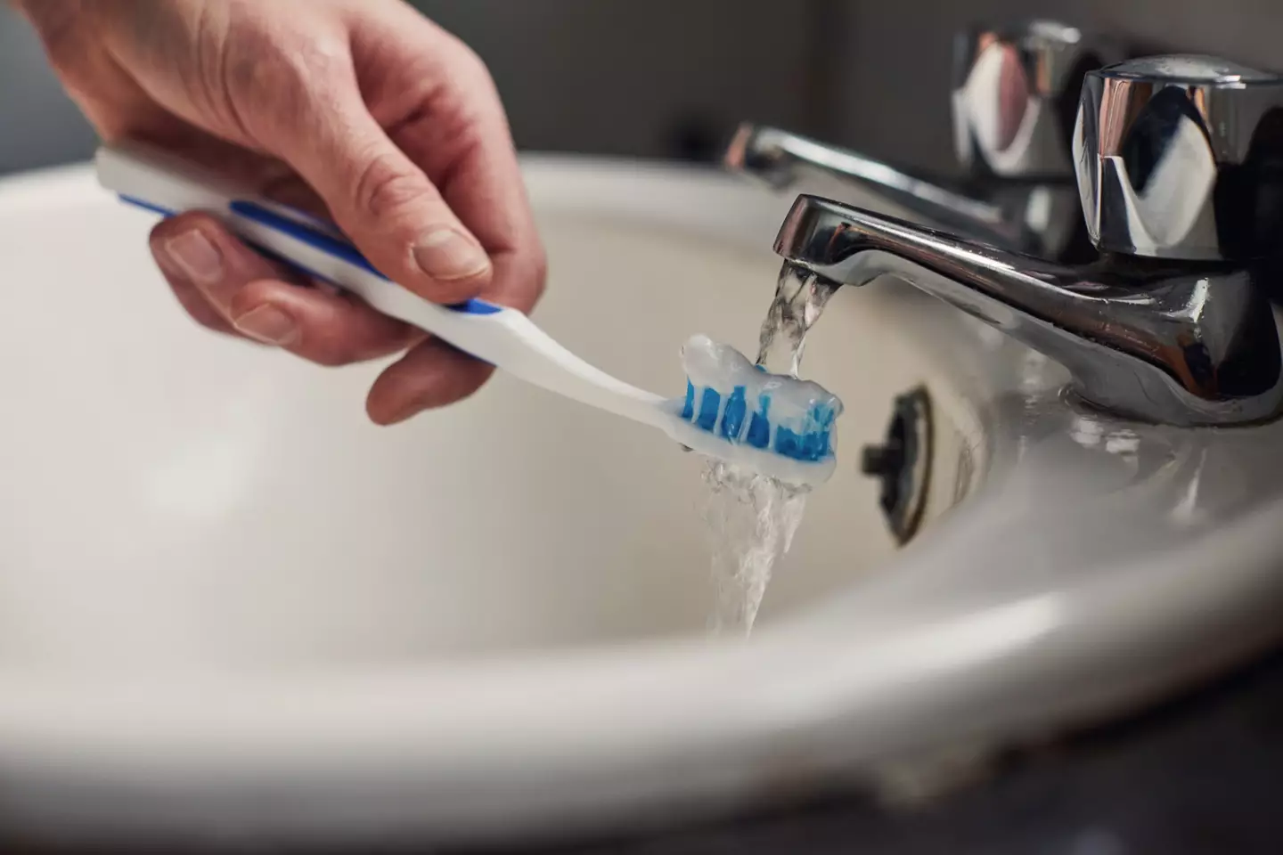 A woman admitted she had to force her boyfriend to brush his teeth.