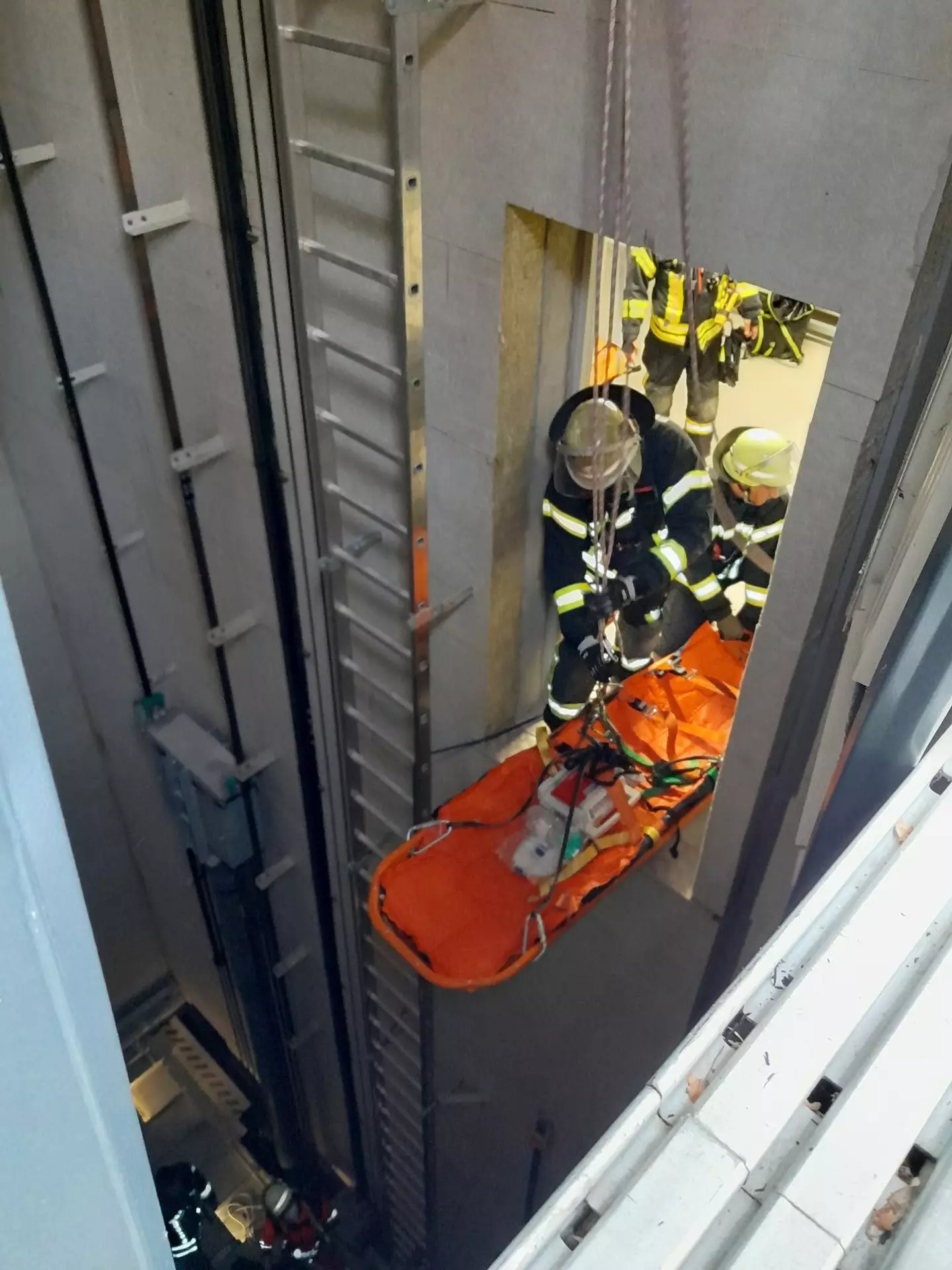 She was plunged a stomach-flipping 35 ft down the lift shaft on Saturday.