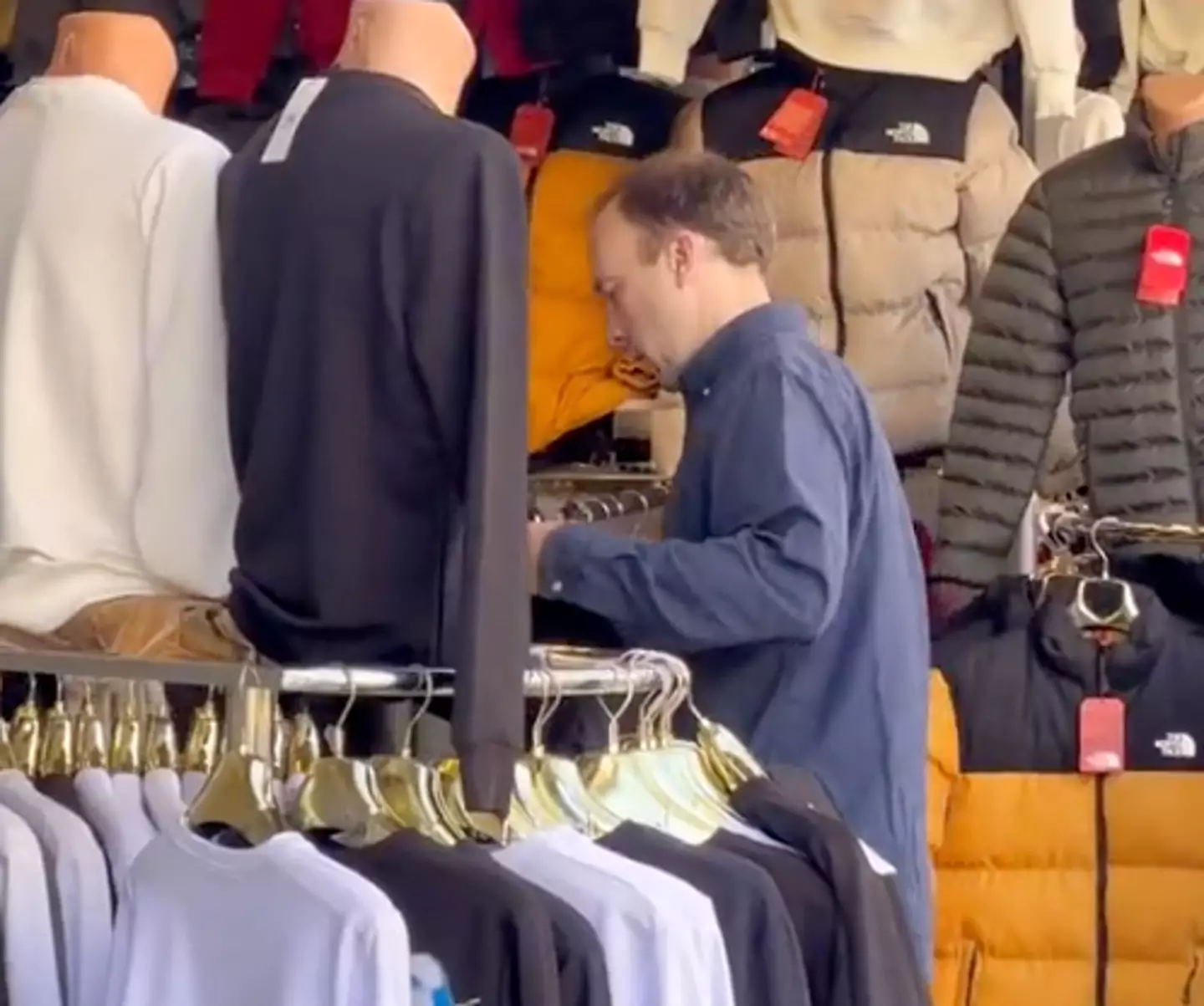 Hancock was spotted browsing some street clobber in Istanbul.