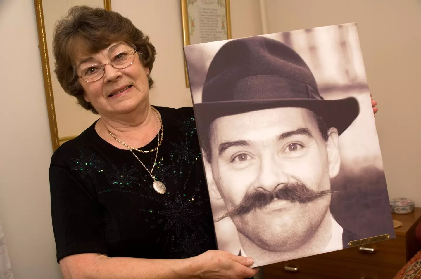 Eira Peterson with a picture of her son.