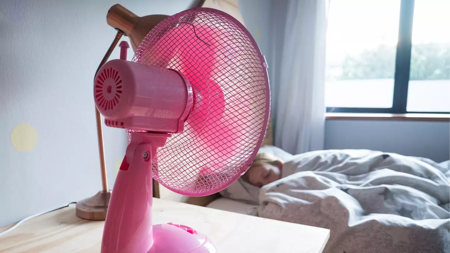 Doctor warns over hidden impact sleeping with a fan on all night has during heatwave