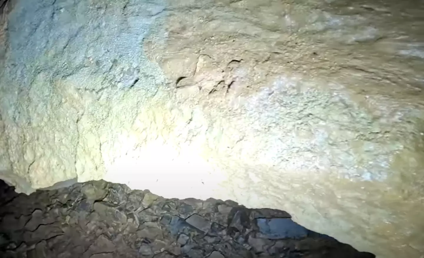 Viewers think they spotted someone's belongings left in the cave (YouTube/ActionAdventureTwins)