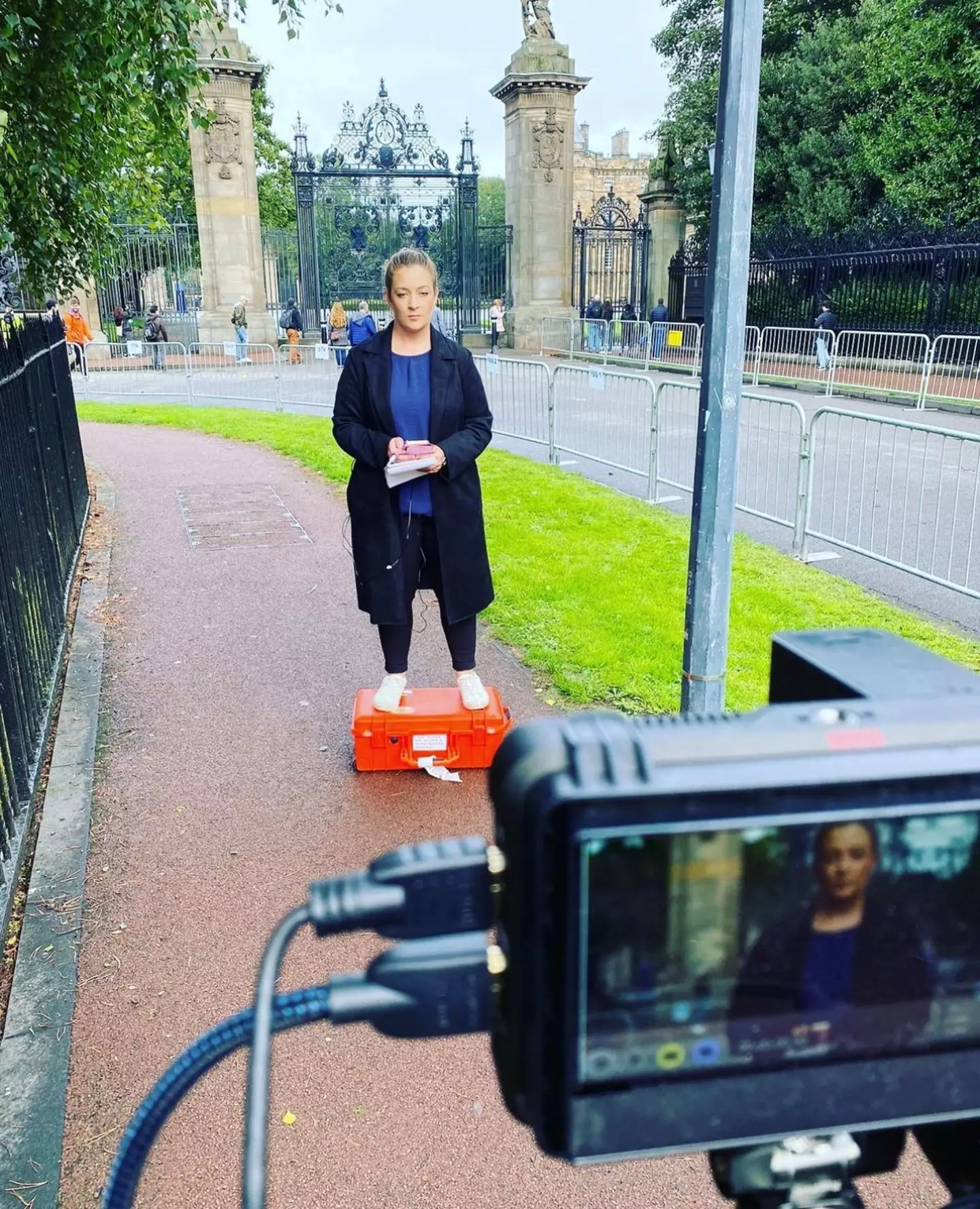 Ally covering the Queen's death, London.