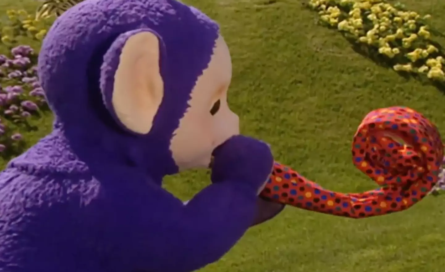 Tinky-Winky got his hands on a giant party blower.