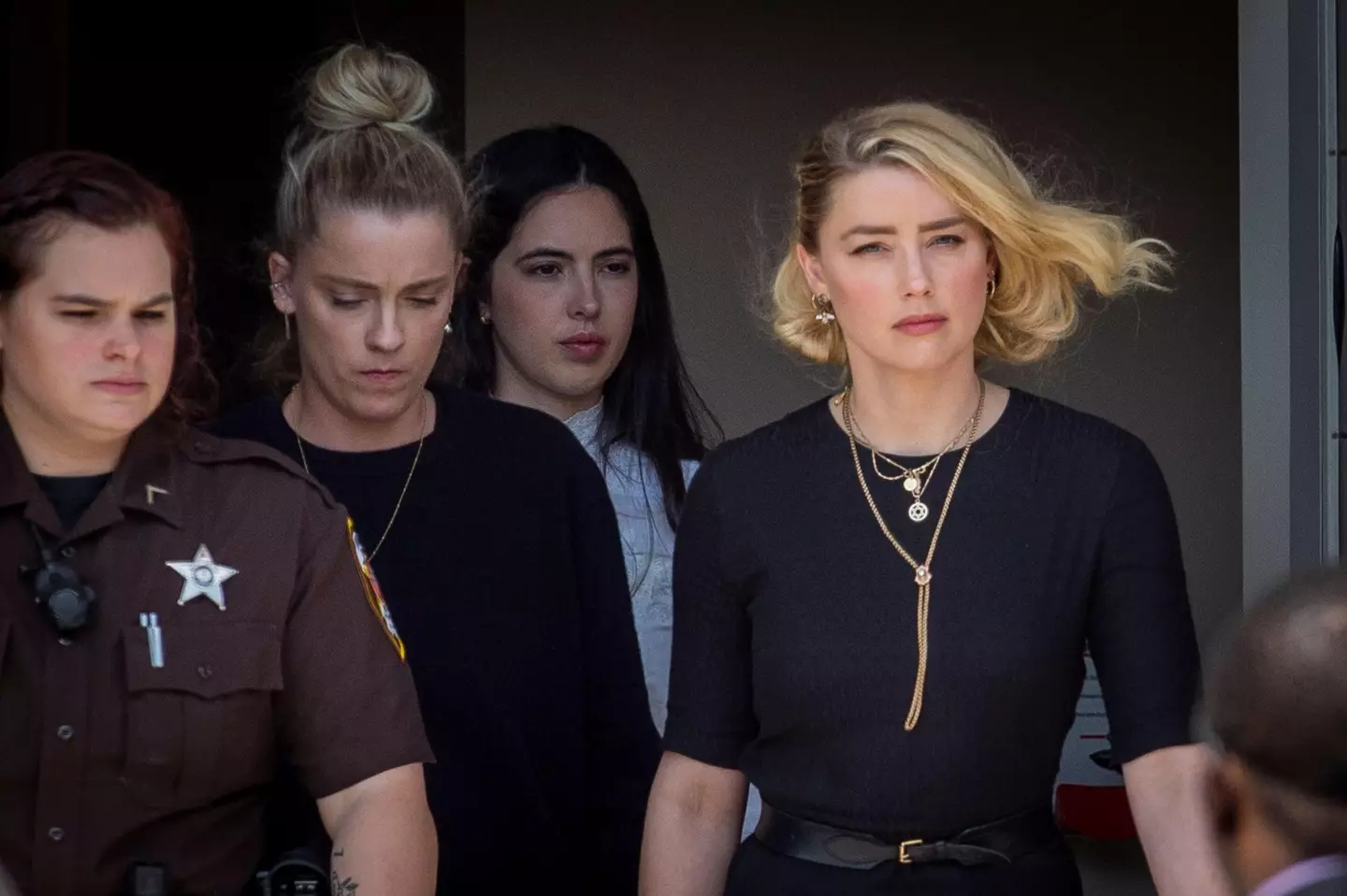 Amber Heard departs the courthouse following the verdicts in her trial against Johnny Depp.