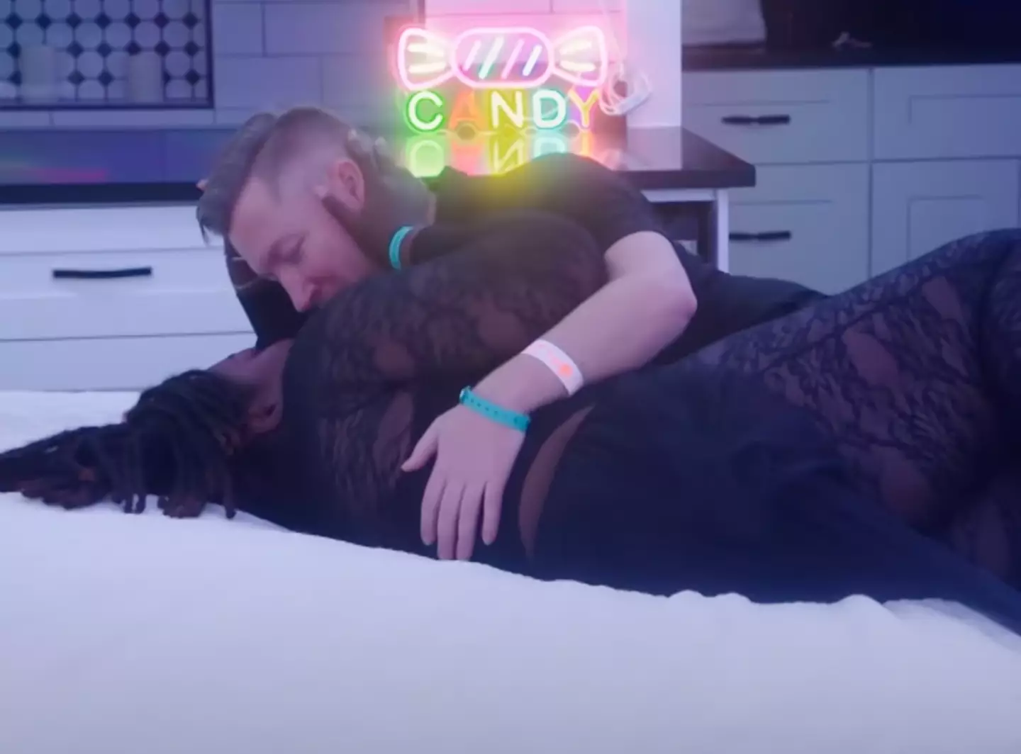The trailer shows her getting intimate with someone on the show (TLC)