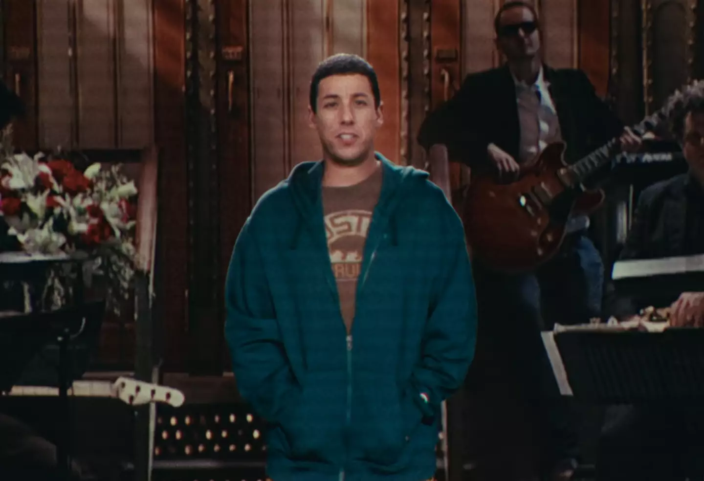 If only there was somewhere else they could have found old footage of Adam Sandler on SNL... (Netflix)