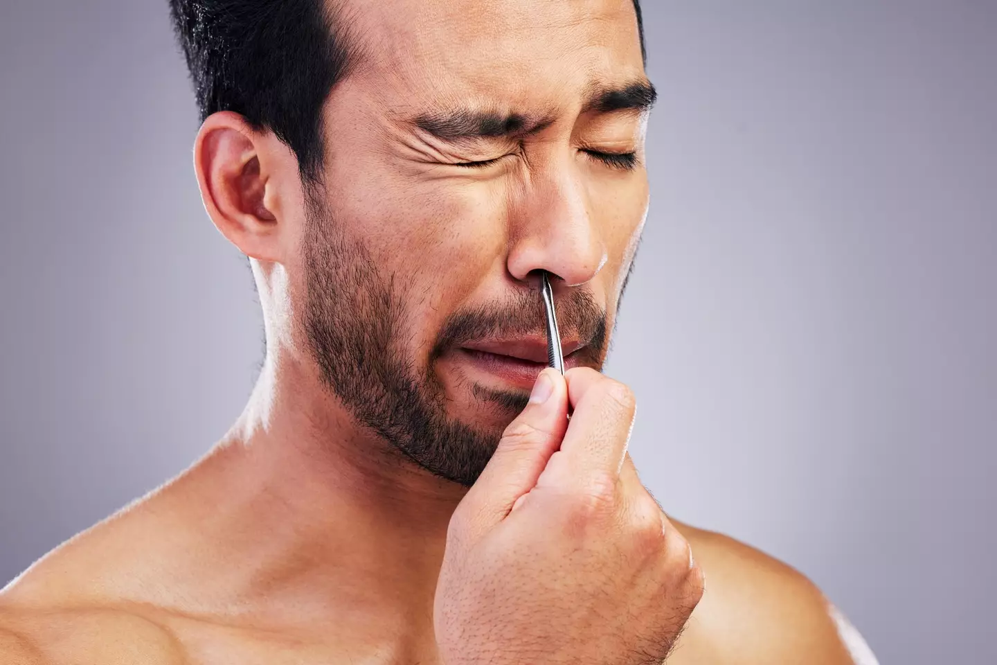 Plucking can also be pretty painful. (Getty Stock Images)
