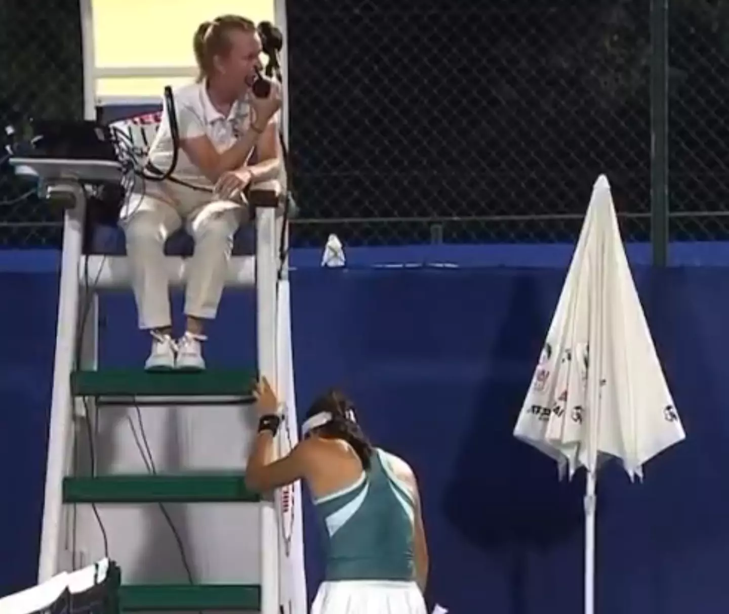 Raducanu hid by the umpire's chair after spotting the man in the crowd (Sky Sports)