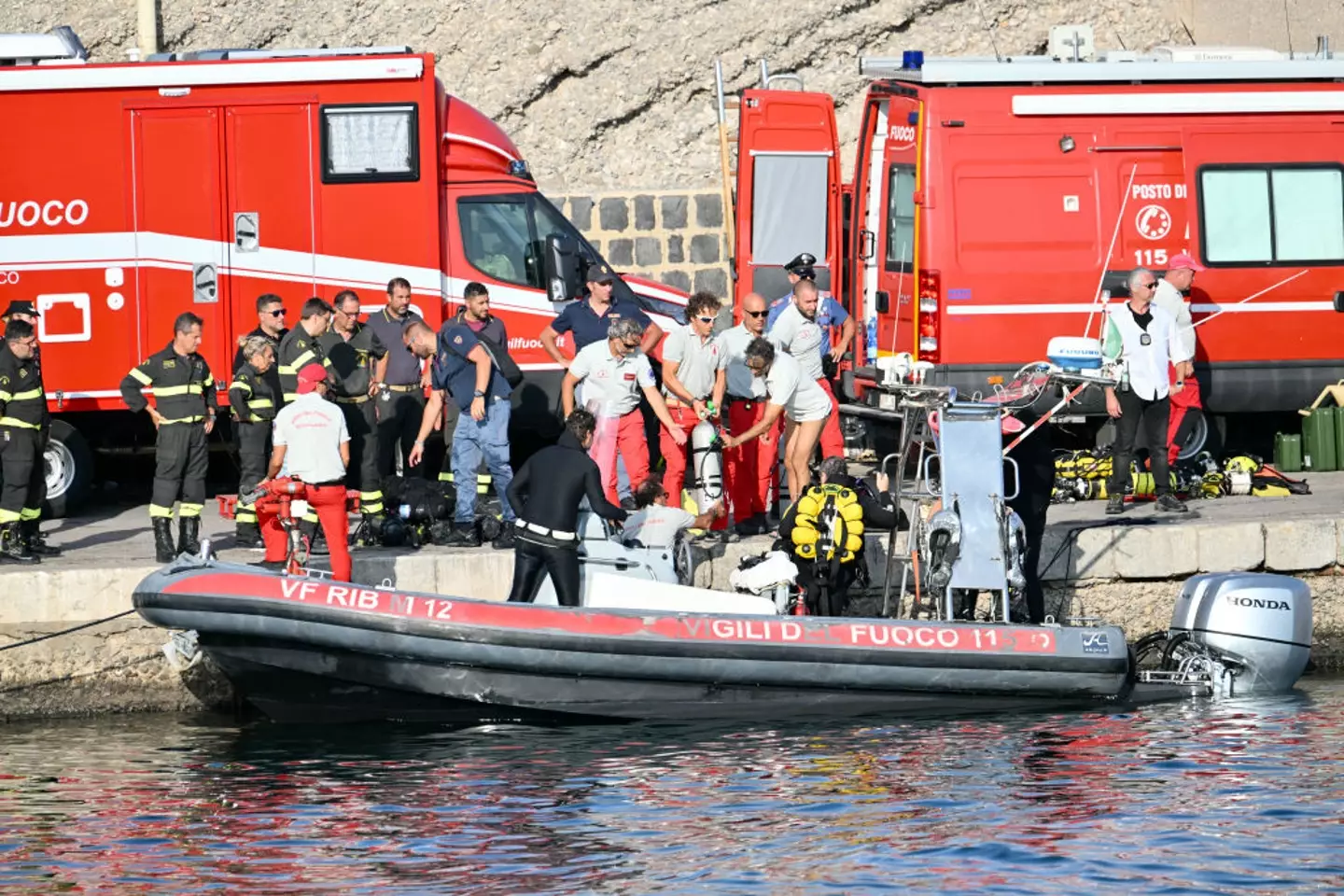 Specialist divers have been scouring the location of the sunken yacht. (ALBERTO PIZZOLI/AFP via Getty Images)