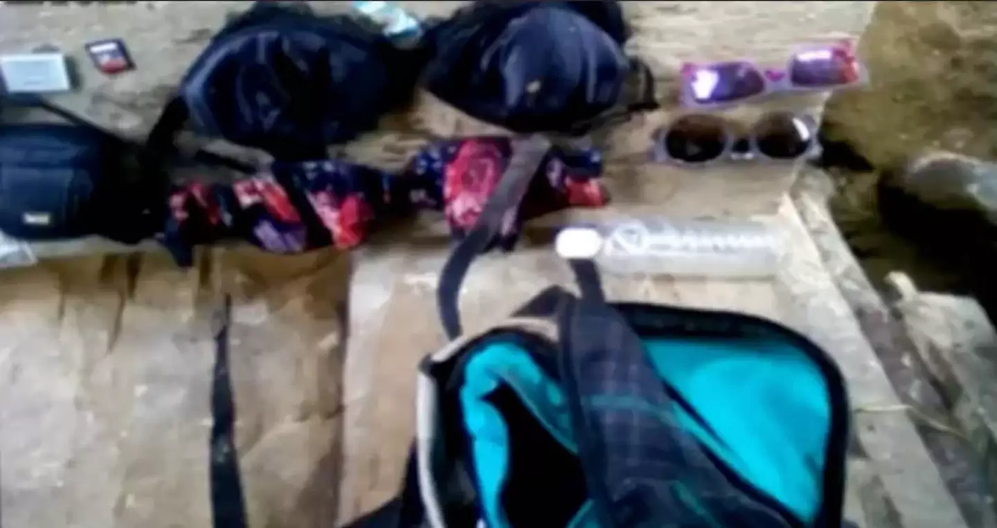 Photos found included ones of their belongings laid out on a rock (TVN2)