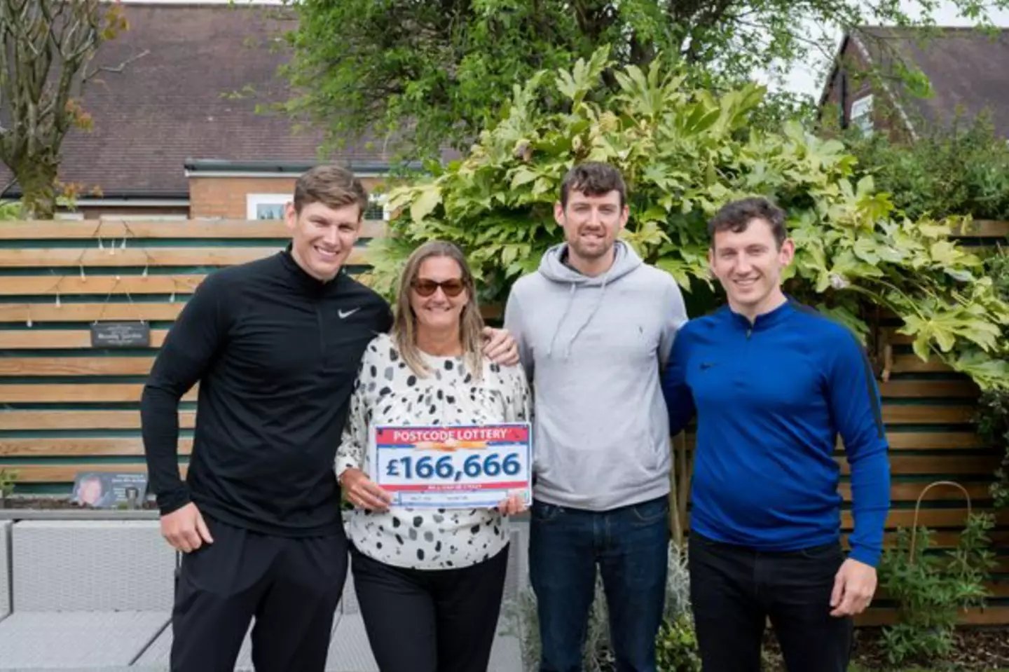 Lesley with sons Alan, Matthew and Steven.