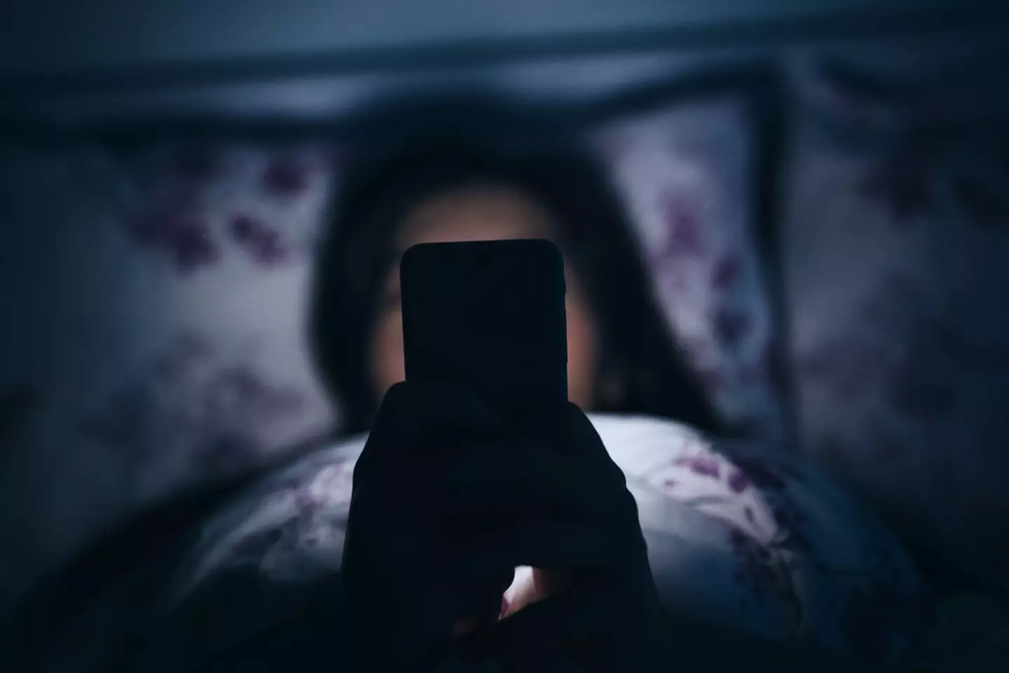 We're all guilty of the odd doom scroll before bed (Getty Stock Image)